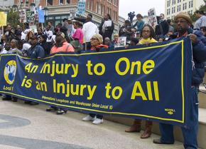 ILWU Local 10 members demonstrate at Oscar Grant Plaza in Oakland